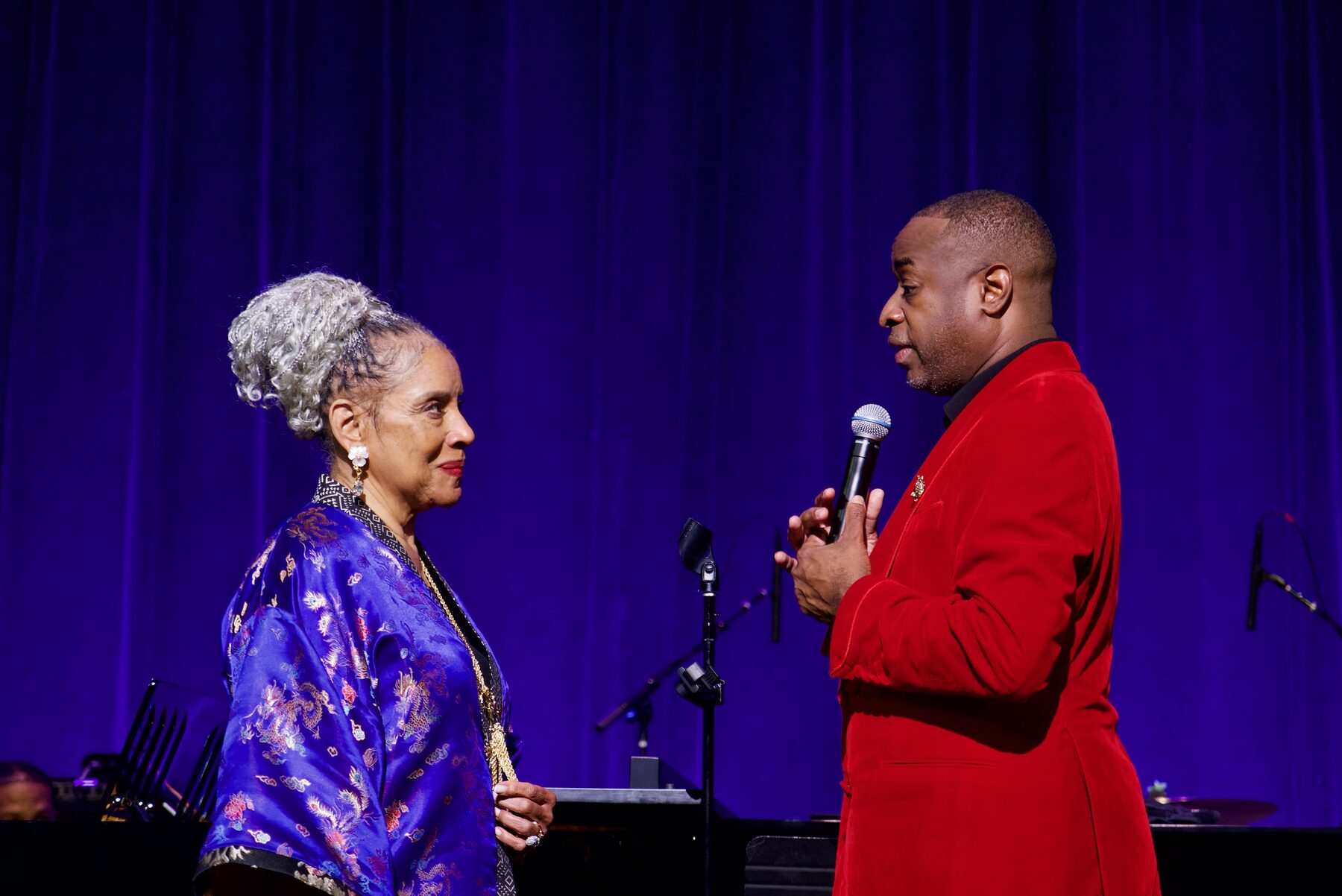 Damien Sneed on stage with Phylicia Rashad