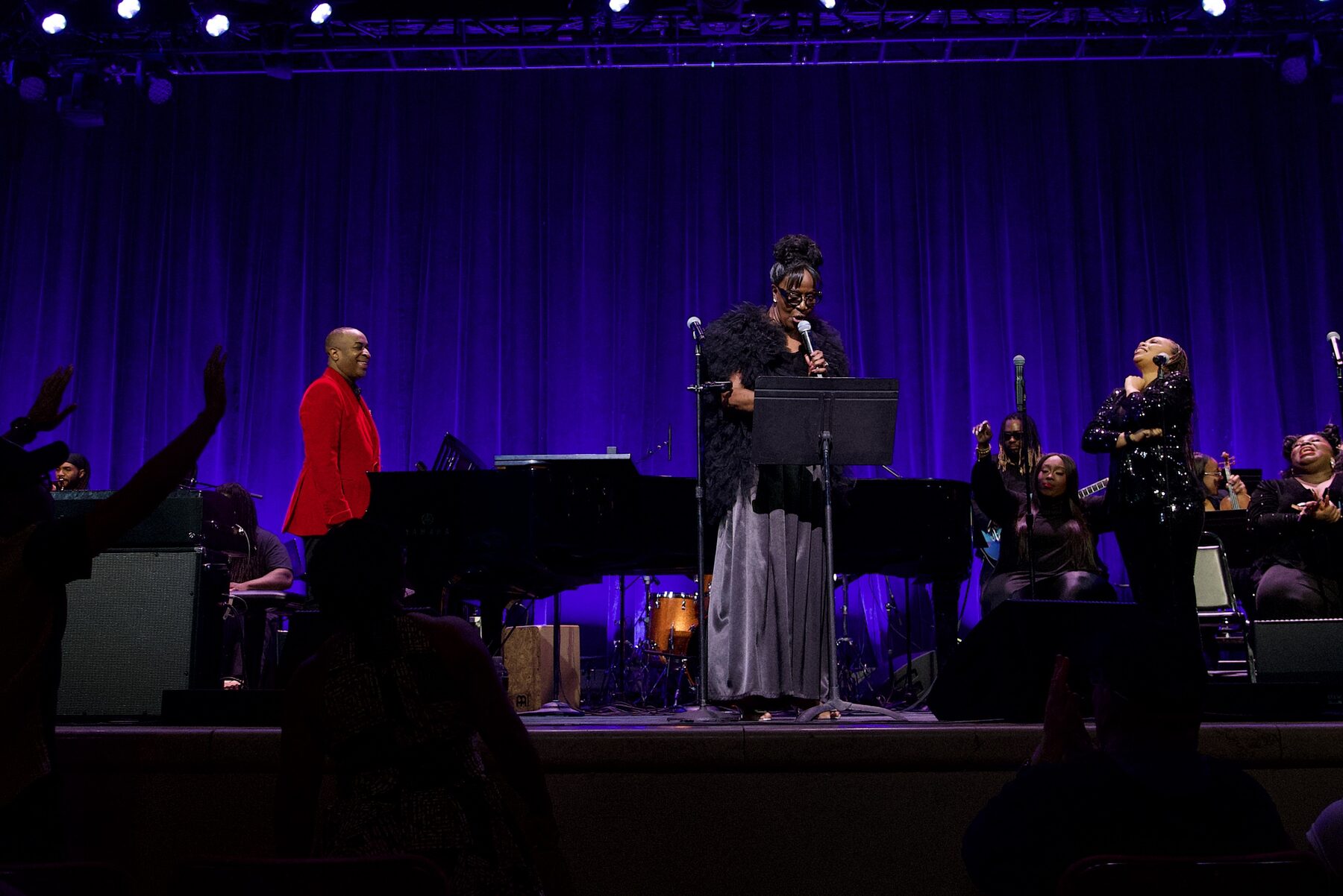 Wide view of the full ensemble on stage